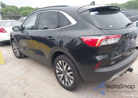 2020 Ford Escape Titanium z USA, uszkodzony, nr VIN 1FMCU9J98LUA34750